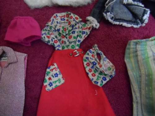 Lovely lot of genuine Barbie clothing.