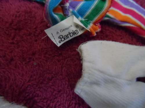 Lovely lot of genuine Barbie clothing.