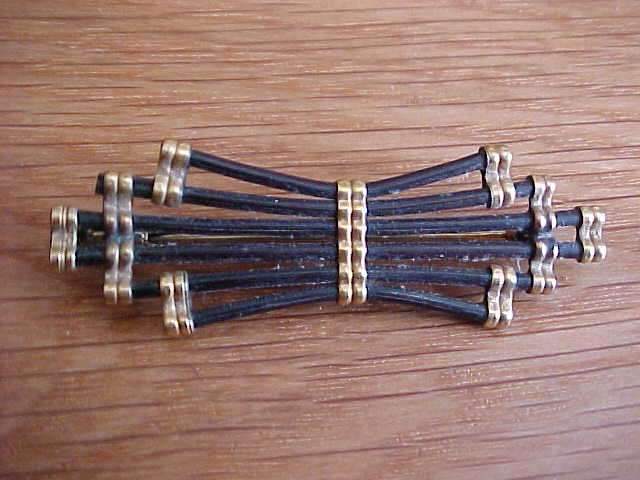 MOST UNUSUAL BLACK AND GOLD VINTAGE BROOCH