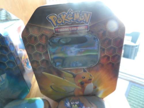 Beautiful pokemon tins look beautiful for cards 5 smaller and 2 larger all different