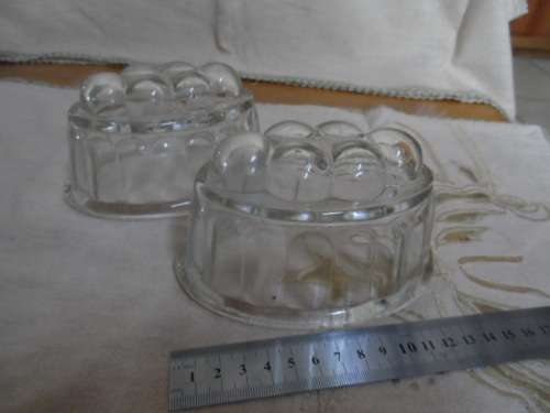 Two smaller glass jelly moulds vintage