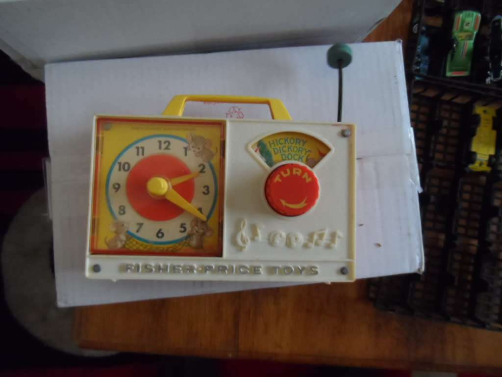 VINTAGE FISHER PRICE TOY BABIES CLOCK.