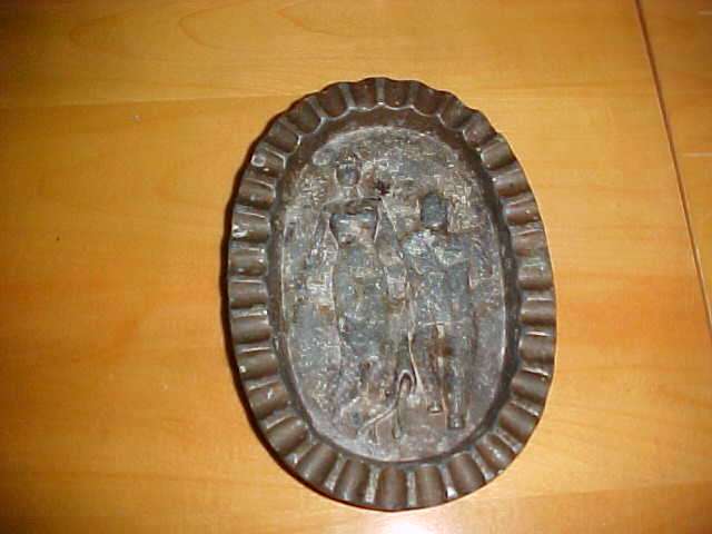 HEAVY METAL CAST ASHTRAY WITH  FRONT AND A DIFFERENT BACK SO UNUSUAL