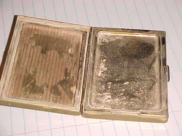 BRUSH IN LEATHER CASE AND POWDER COMPACT