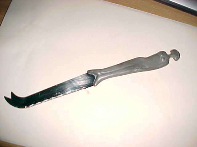 PEWTER KNIFE BY "BOYES"  OF A LADY