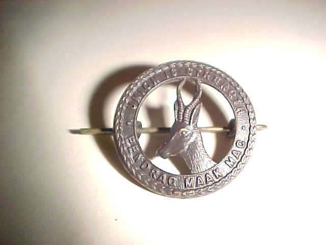 METAL  BADGE