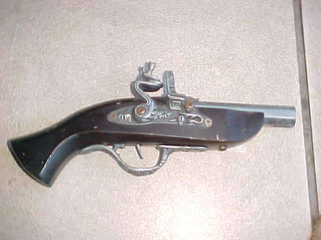 Antique pistol replica cigarette lighter