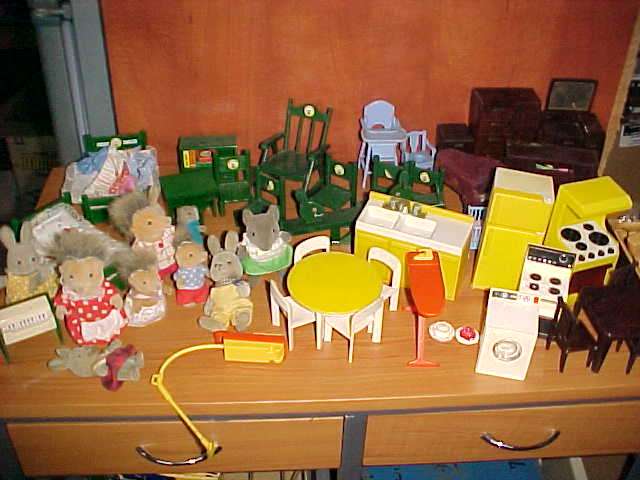 Very large lot of Sylvanian family and dolls house furniture and accesories