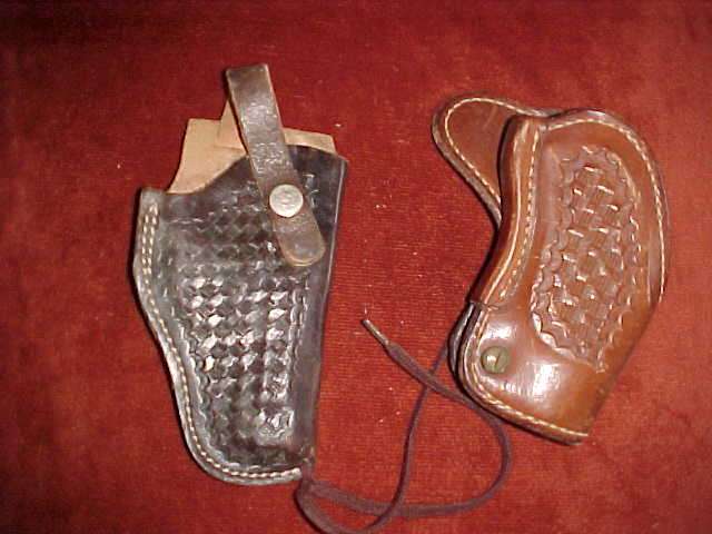 Two leather gun holsters