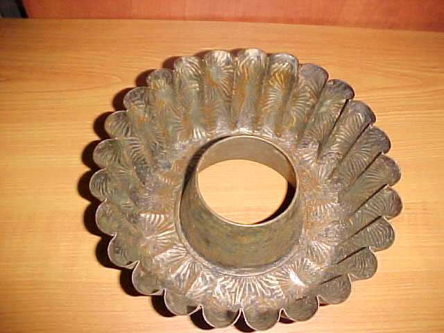 Very old metal mould with pattern.