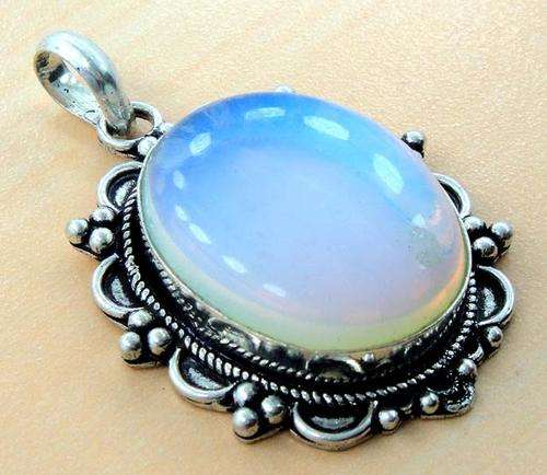 STUNNING  LARGE (2 1/4inch) GENUINE FIRE OPALITE SET IN SOLID 925 STERLING SILVER.