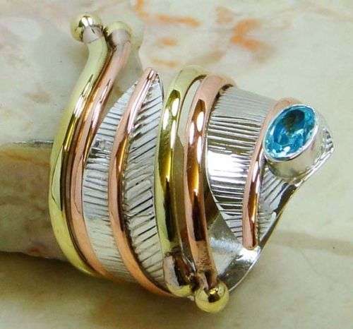 STUNNING RING !! **[[ GENUINE BLUE TOPAZ ]] & 925 STERLING SILVER with BRASS & COPPER. SIZE 7