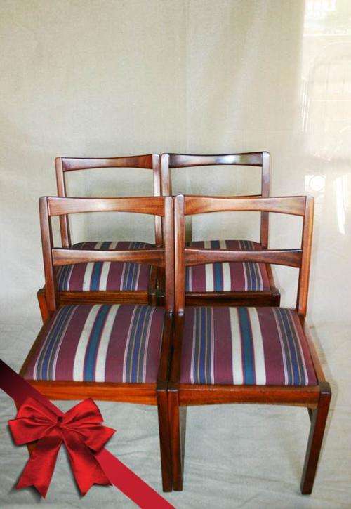 Set of 4 dining room chairs.  Looks like it could be mohagony