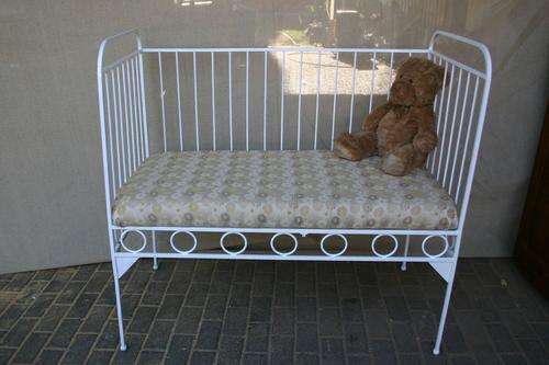 Old steel cot, convert to a big bench