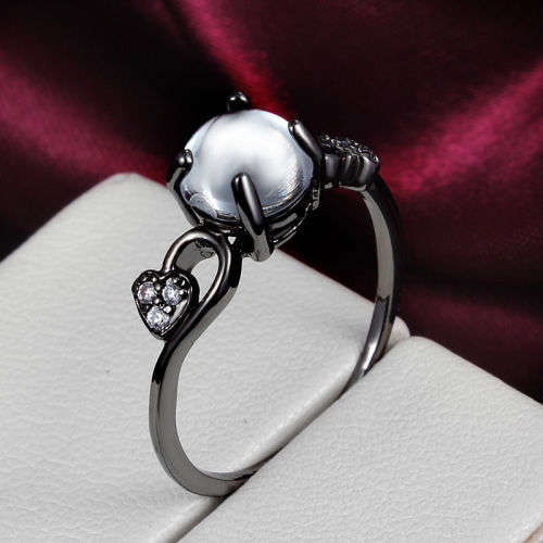Black gold plated imitation white cat eye ring -  Size 7
