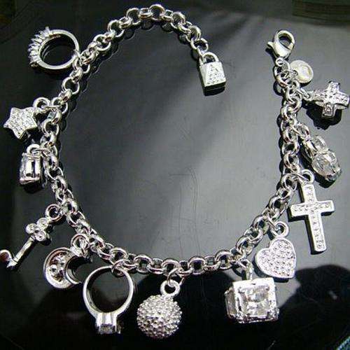 ***925 Sterling silver plated Charm Bracelet including the charms***BEAUTIFUL!