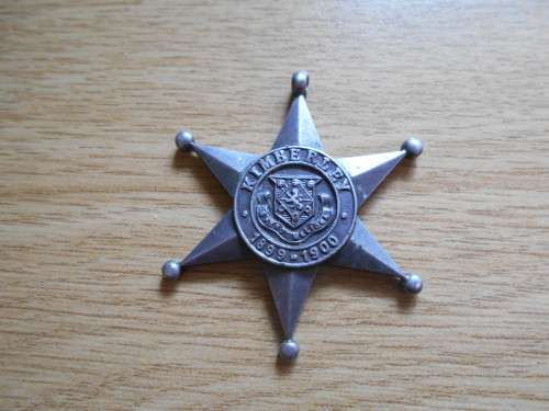 A silver Kimberley Star Medal, Mayor`s Siege Medal 1900, hallmarked Birmingham 1900