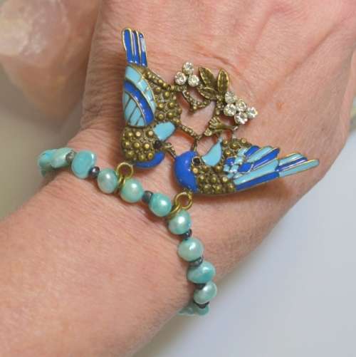 Blue Freshwater Baroque pearls with Bird detail