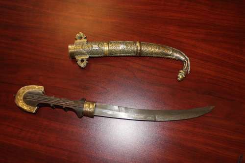 Antique Moroccan Berber Khoumya Dagger with hand detailed metal sheath and silver accents circa 1900