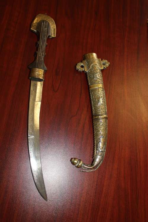 Antique Moroccan Berber Khoumya Dagger with hand detailed metal sheath and silver accents circa 1900