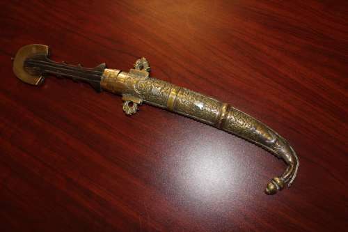 Antique Moroccan Berber Khoumya Dagger with hand detailed metal sheath and silver accents circa 1900
