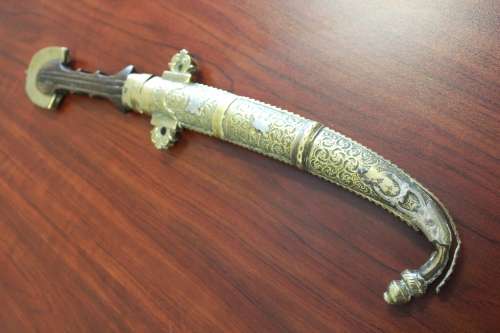 Antique Moroccan Berber Khoumya Dagger with hand detailed metal sheath and silver accents circa 1900