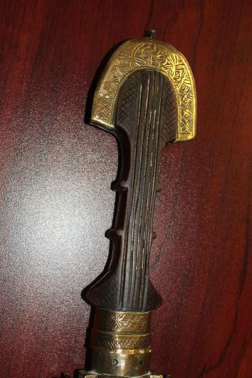 Antique Moroccan Berber Khoumya Dagger with hand detailed metal sheath and silver accents circa 1900