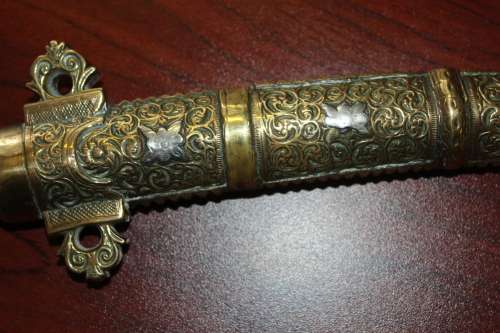 Antique Moroccan Berber Khoumya Dagger with hand detailed metal sheath and silver accents circa 1900