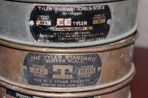 9 piece set of Copper and Brass Laboratory test sieves diameter 21cm height of stack 47cm