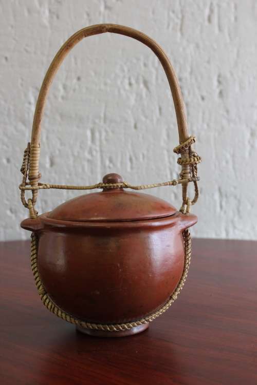 ANTIQUE CHINESE TERRACOTTA WATER POT WITH WOVEN CANE HANDLE MARKED ON BASE CIRCA EARLY 1900S