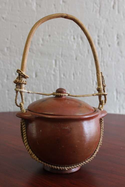 ANTIQUE CHINESE TERRACOTTA WATER POT WITH WOVEN CANE HANDLE MARKED ON BASE CIRCA EARLY 1900S