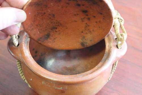 ANTIQUE CHINESE TERRACOTTA WATER POT WITH WOVEN CANE HANDLE MARKED ON BASE CIRCA EARLY 1900S