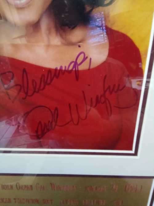 Original Oprah Winfrey Autographed Headshot in Lovely frame. 78cm x 49cm