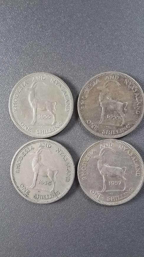 Rhodesia /Nyasaland -4 x One Shillings -1955 x2, 1956 and 1957