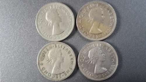 Rhodesia /Nyasaland -4 x One Shillings -1955 x2, 1956 and 1957