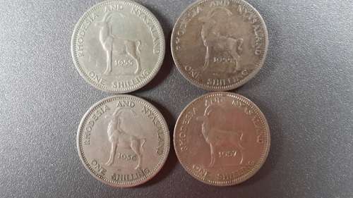 Rhodesia /Nyasaland -4 x One Shillings -1955 x2, 1956 and 1957
