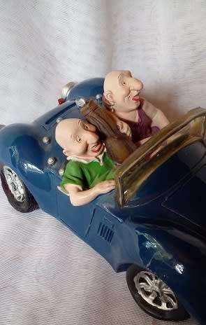 Vintage -Ceramic Car,- Money Box with Two Funny Guys, off on a Golf Trip.