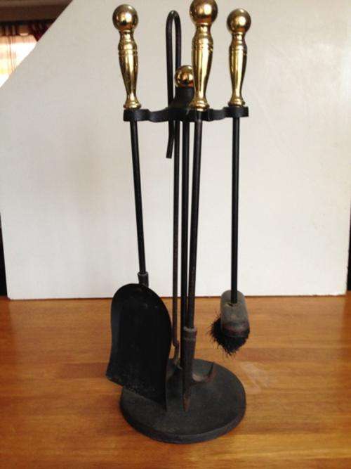 A Complete Large Black and gold metal Fireplace tool set