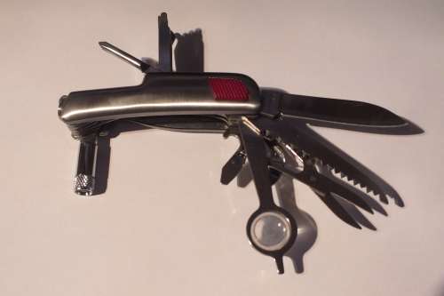 THIRTEEN TOOLS IN MULTI PURPOSE STAINLESS STEEL POCKET KNIFE