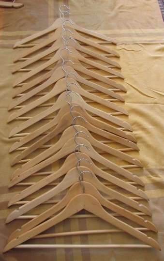 Lot of 16x wooden coat hangers - in excellent condition