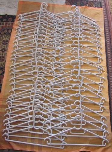 Bulk Lot of 50 white plastic coat hangers in excellent condition