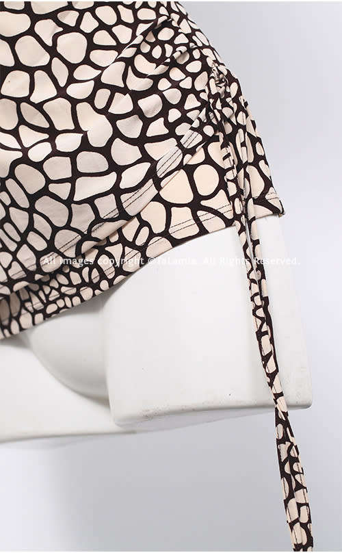 Ladies beige cream rouged stretch top with giraffe print pattern