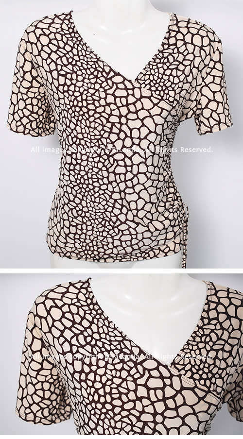 Ladies beige cream rouged stretch top with giraffe print pattern