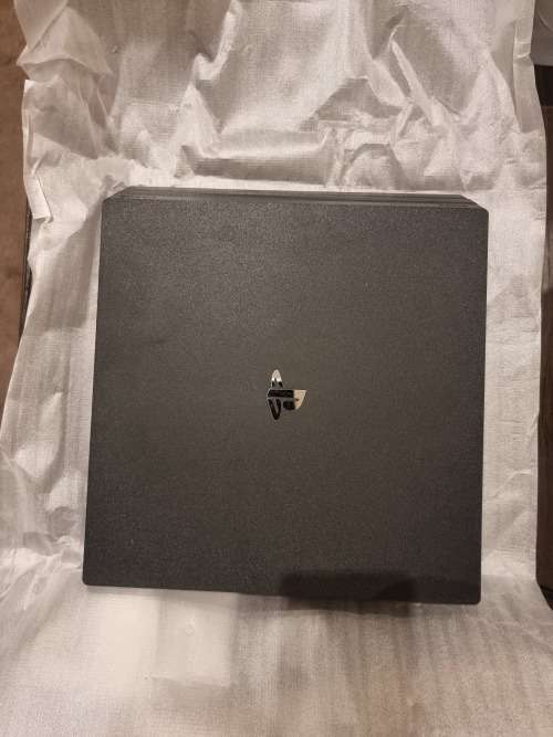 PS4 PRO 1TB EXCELLENT CONDITION INCLUDING 1 CONTROLLER THAT'S AND 2 NEW GAMES. PRICE NEGOTIABLE