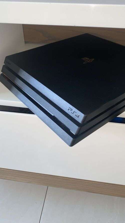 PS4 PRO 1TB EXCELLENT CONDITION INCLUDING 1 CONTROLLER THAT'S AND 2 NEW GAMES. PRICE NEGOTIABLE