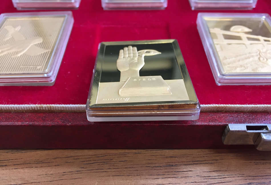 Ten Commandments by Tretchikoff precious metal medallion set. (Gold-plated sterling silver)