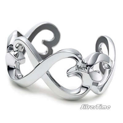 ON-SALE: With FREE silver polishing cloth - Silver heart Bangle