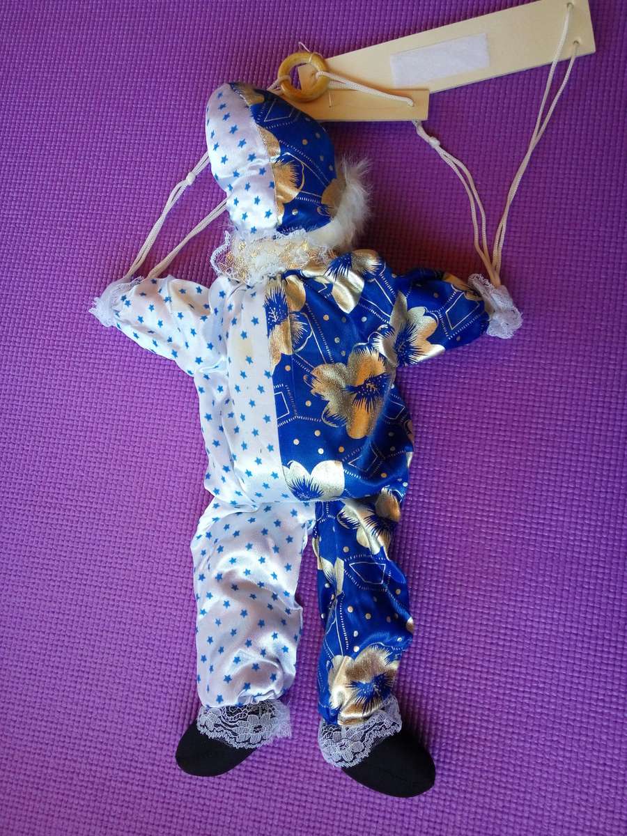 Marionette (String) Puppet on a Swing