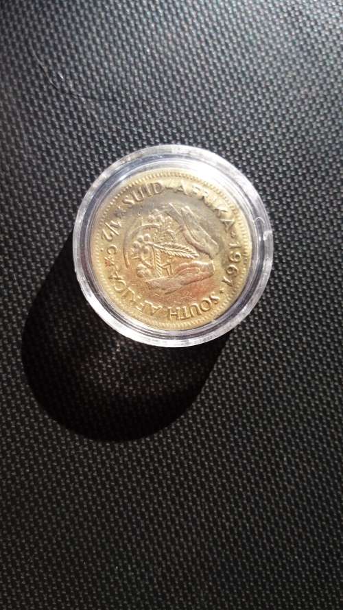 stunning1961 half cent in capsule