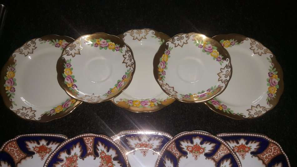 Royal Albert Lot of 24 Perfect Saucers & Side plates incl 1927 Cambridge , Celebration, Royalty Gold